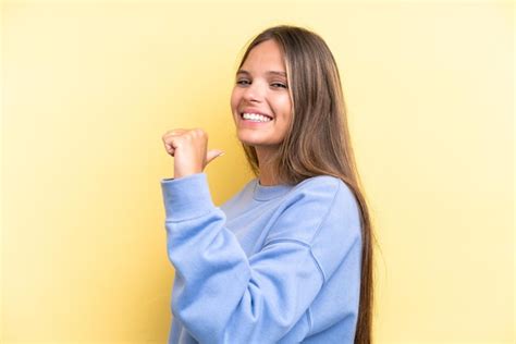 Premium Photo Young Caucasian Woman Isolated On Yellow Background