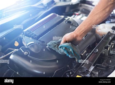 Mechanic Cleaning Car Engine Stock Photo Alamy