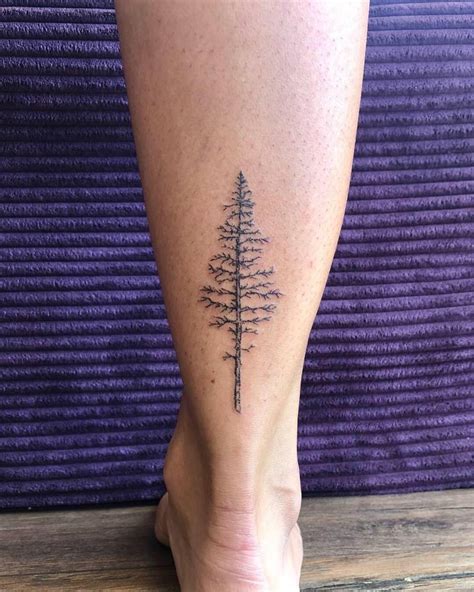 Hand Poked Pine Tree Tattoo On The Achilles