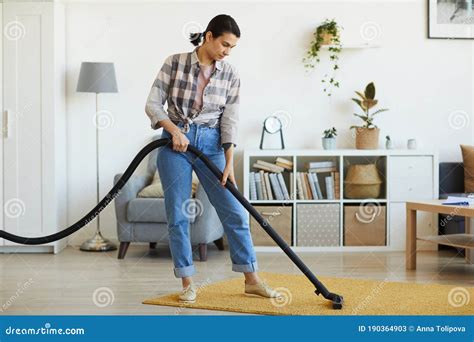 Housekeeper Vacuuming The Carpet Stock Image Image Of Cleaning