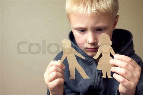 Confused Child With Paper Parents Stock Image Colourbox
