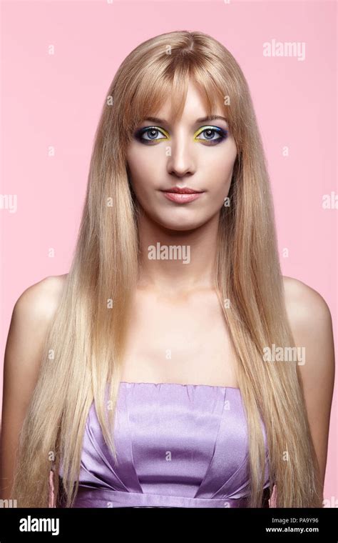 Young Woman With Long White Hair On Pink Background Portrait Of Blonde Female In Lilac Dress