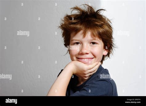 Boy 12 Years Old With Tousled Hair Stock Photo Alamy