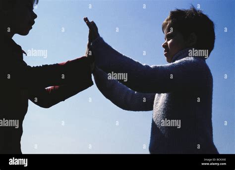 Two Children Playing Clapping Game Low Angle View Stock Photo Alamy