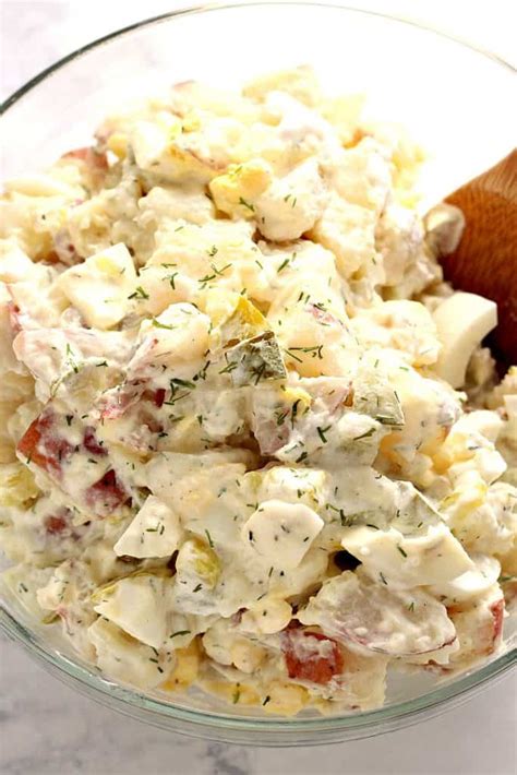 This recipe is what would happen if your favorite deviled eggs hooked up with a sinfully delicious potato salad. Dill Pickle Potato Salad Recipe - Crunchy Creamy Sweet