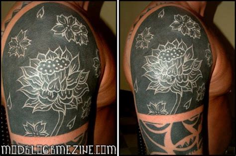 Tattooing on dark skin (ft. The Newest Trend, Solid Black Tattoos with White ...