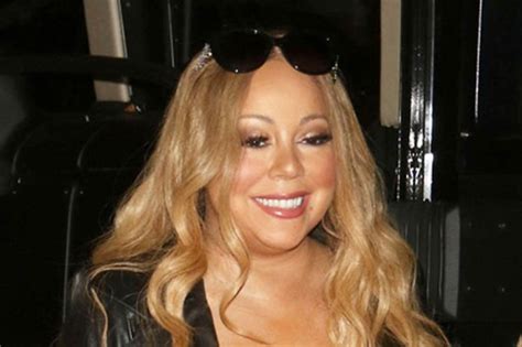 mariah carey suffers nip slip as assets erupt from plunging dress daily star