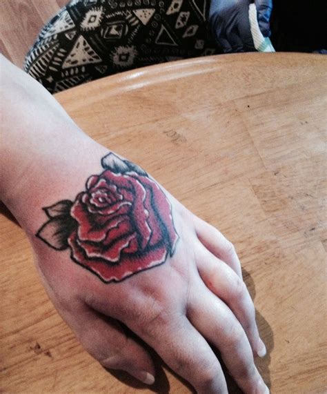 Rose tattoos will never go out of style, but these dainty pieces give a traditional choice a modern spin. Rose tattoo, red rose, rose, tattoo, hand, placement ...