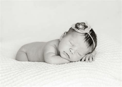 Baby Sleeping On White Cotton · Free Stock Photo