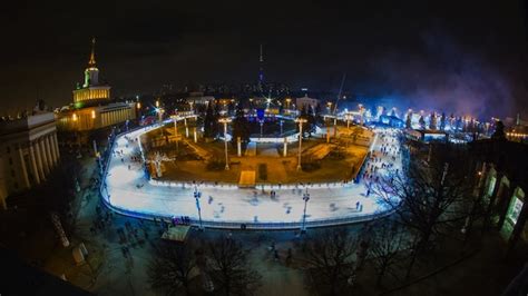 Young man skating on ice rink. Largest Ice Skating Rink in Europe Opens in Moscow