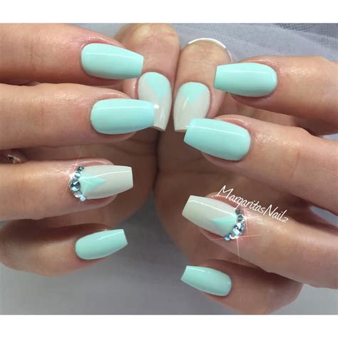 Green nails may be (1) due to a pseudomonas aeruginosa infection causing a green nail syndrome or (2) the result of copper in tap water.:791. Spring nails mint green nail art | Green nails