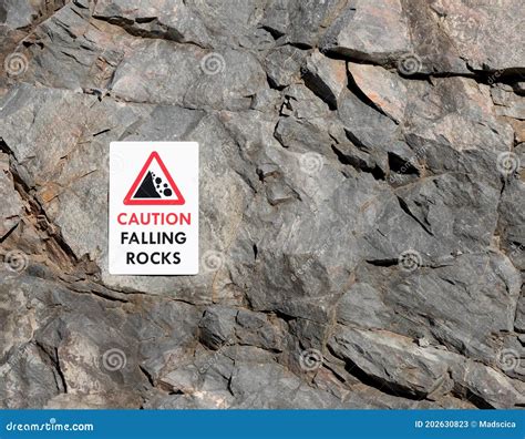Caution Falling Rocks Sign Stock Image Image Of Stone 202630823