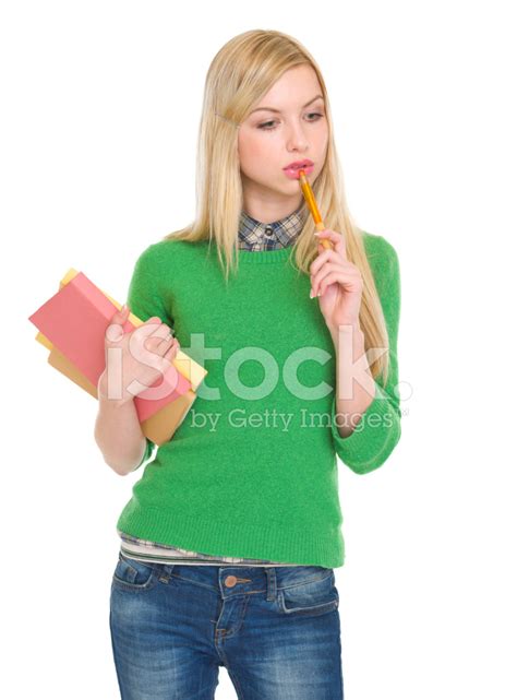 Portrait Of Thoughtful Student Girl With Books Stock Photo Royalty