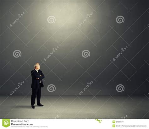 Man Standing In Dark Room Stock Photo Image Of Grey 34633670
