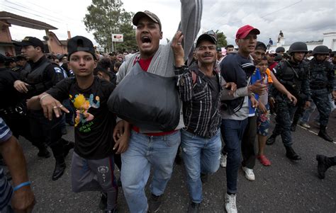 Honduran migrants bed down after pushing into Guatemala