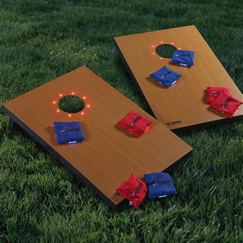 The bean bag toss game of corn hole seems to have many different histories. Triumph Sports LED Glow Cornhole Set - Cornhole at Hayneedle