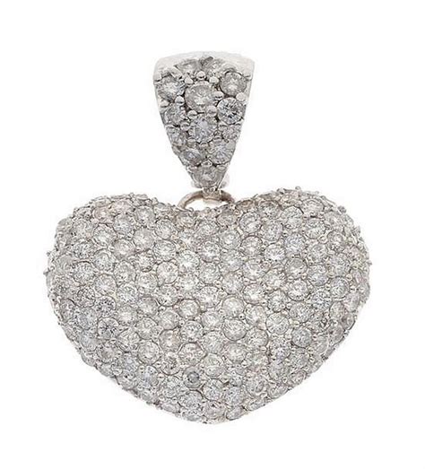 Diamond pendants never go out of fashion and are a mainstay in any jewelry wardrobe. A diamond pendant/enhancer, the heart shaped pendant pave ...