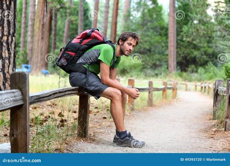 Hiking Man Resting With Backpack In Forest Park Stock Photo Image Of
