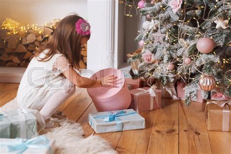 Little Girl Opening A Christmas T Stock Image Colourbox