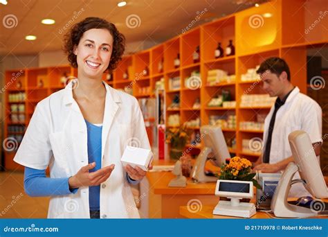 Happy Pharmacist Recommending Drug Royalty Free Stock Photos Image
