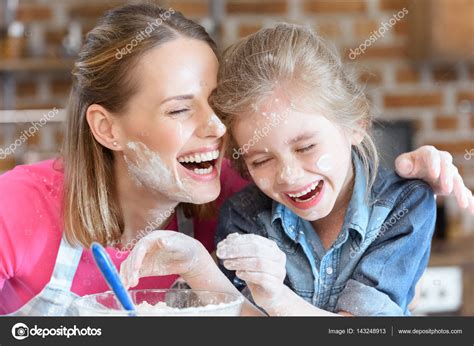 Mother And Daughter Cooking — Stock Photo © Dmitrypoch 143248913
