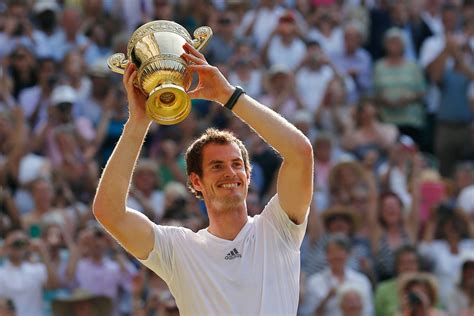 Goes back for a hug. Murray ends 77 years of British hurt as he wins Wimbledon ...