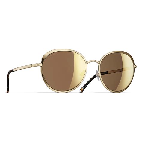 Founded in 1967, it was a division of federated department stores with 76 stores when the chain was sold and dismantled in 1988. Round Sunglasses Gold eyewear | CHANEL