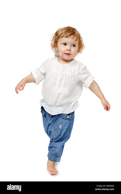 Baby Taking First Steps Stock Photo Alamy
