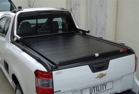 The canopy consists out of an aluminium frame which is covered. SECURI LID ALUMINIUM ROLLER SHUTTER DOORS FOR BAKKIES