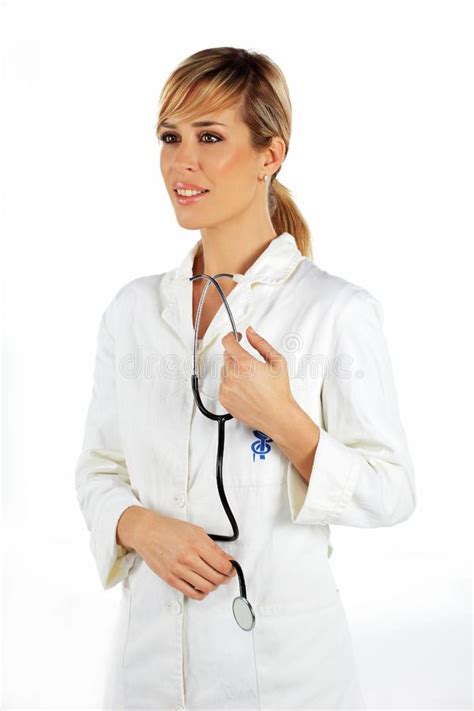 Nurse Standing And Holding Her Stethoscope Stock Image