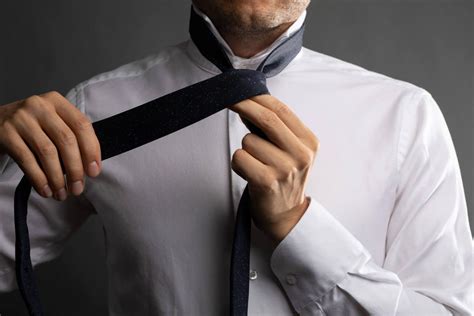 The windsor knot, also known as the full or double windsor, is one of the most popular ways to tie a tie. How to Tie a Half Windsor Knot - The Modest Man