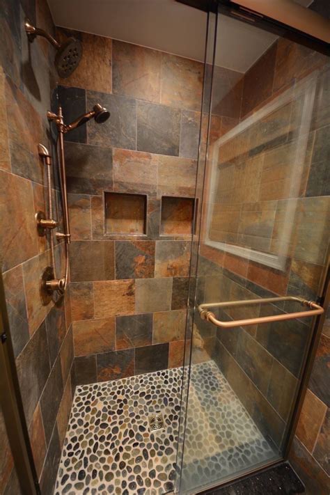 Find the cost to replace tile of a small chic herringbone wall tile has become a shower design trend. Basement Tiled Showers Ideas| Basement Masters