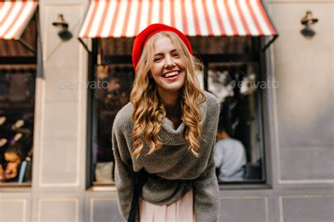 Portrait Of Curly Hairstyle Blonde Attractive Girl Young Woman In Red