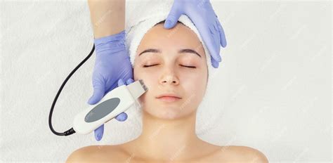 Premium Photo Rejuvenating Facial Treatment Model Getting Lifting Therapy Massage In A Beauty