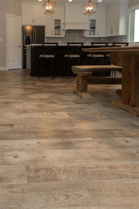 Use high quality wood flooring for stairs, interior barn doors, and more. Exquisite photo #wideplankflooring | Tarkett vinyl ...