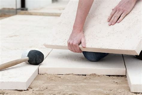 How To Lay Pavers On Sand Or Dirt Premier Pavers And Stone