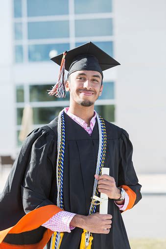 Young Man Graduating From High School Or University Stock Photo