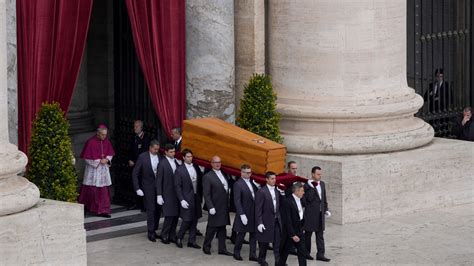photos thousands mourn benedict xvi at funeral celebrated by pope