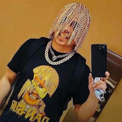 mexican rapper gets gold chain hooks implanted into scalp goes viral editorji