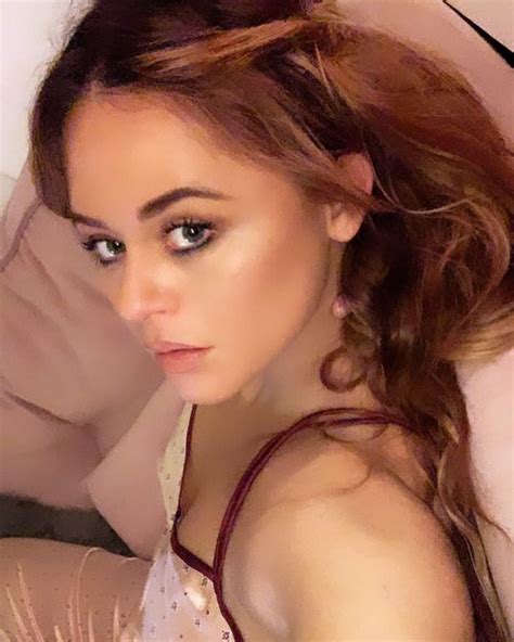 Emily Atack Teases Cleavage As She Poses In Silky Pyjamas For Racy Bed