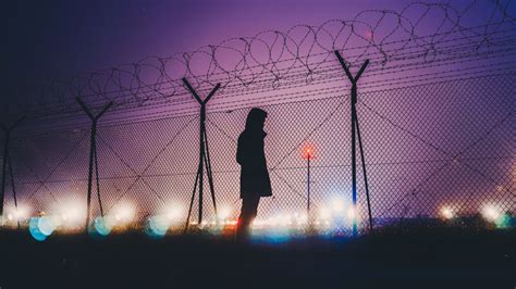 Download Night Lights Person Fence Silhouette 1920x1080 Wallpaper