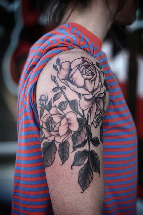 Great Black And White Vintage Rose Flowers Tattoo On Upper