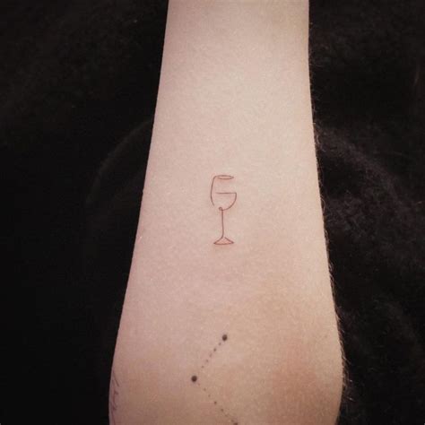 A Minimalistic Wine Glass Tattoo Girly Tattoos Tiny Tattoos For Girls