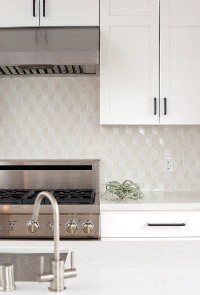 Pair that with some patterned tile, and your white kitchen will never feel boring again. 3D cube geometric tiled splashback in 2020 | Modern ...