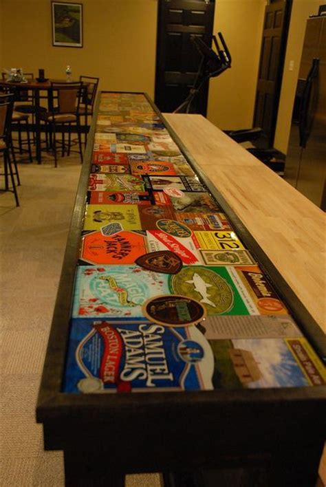 Indoors or outdoors, cover newly built or existing countertops, bar tops or table tops with premium fx poxy professional grade solid resin epoxy for an elegant, indestructible lifetime finish. Bar Top. (Six pack cartons and beer memorabilia with layer ...