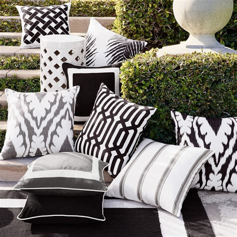 Looking gorgeous on that yellow couch! Outdoor Navy Printed Graphic Links Pillow | Williams Sonoma