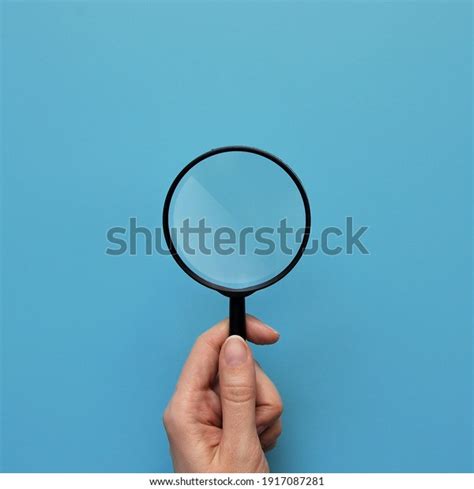 Man Holds Magnifying Glass His Hand Stock Photo 1917087281 Shutterstock