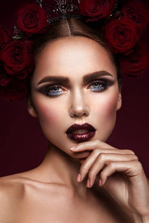 Beauty Fashion Model Girl With Dark Makeup And Roses In Her Hair Stock
