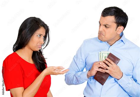 Woman Begging For Money But Upset Man Is Reluctant To Give Cash Stock Foto Adobe Stock