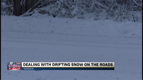officials urging caution amid drifting snow slick roads